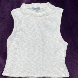 White sleeveless turtle neck crop top